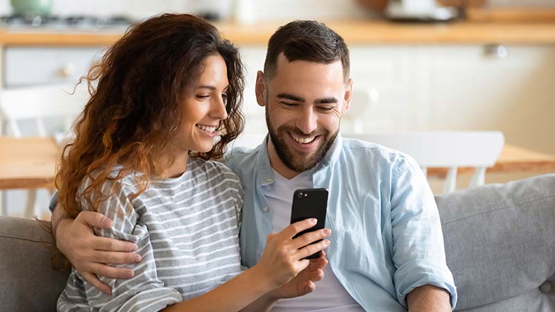 Couple viewing their home inspection report